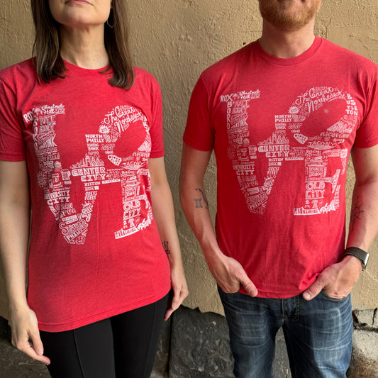 Two people wearing Paul Carpenter's LOVE T-Shirts, each with a