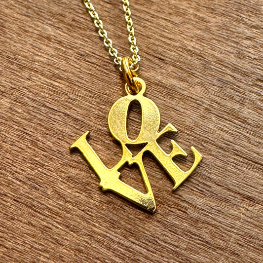 The LOVE Necklace by GeoMetricGem, a beautiful gold-plated piece with a 