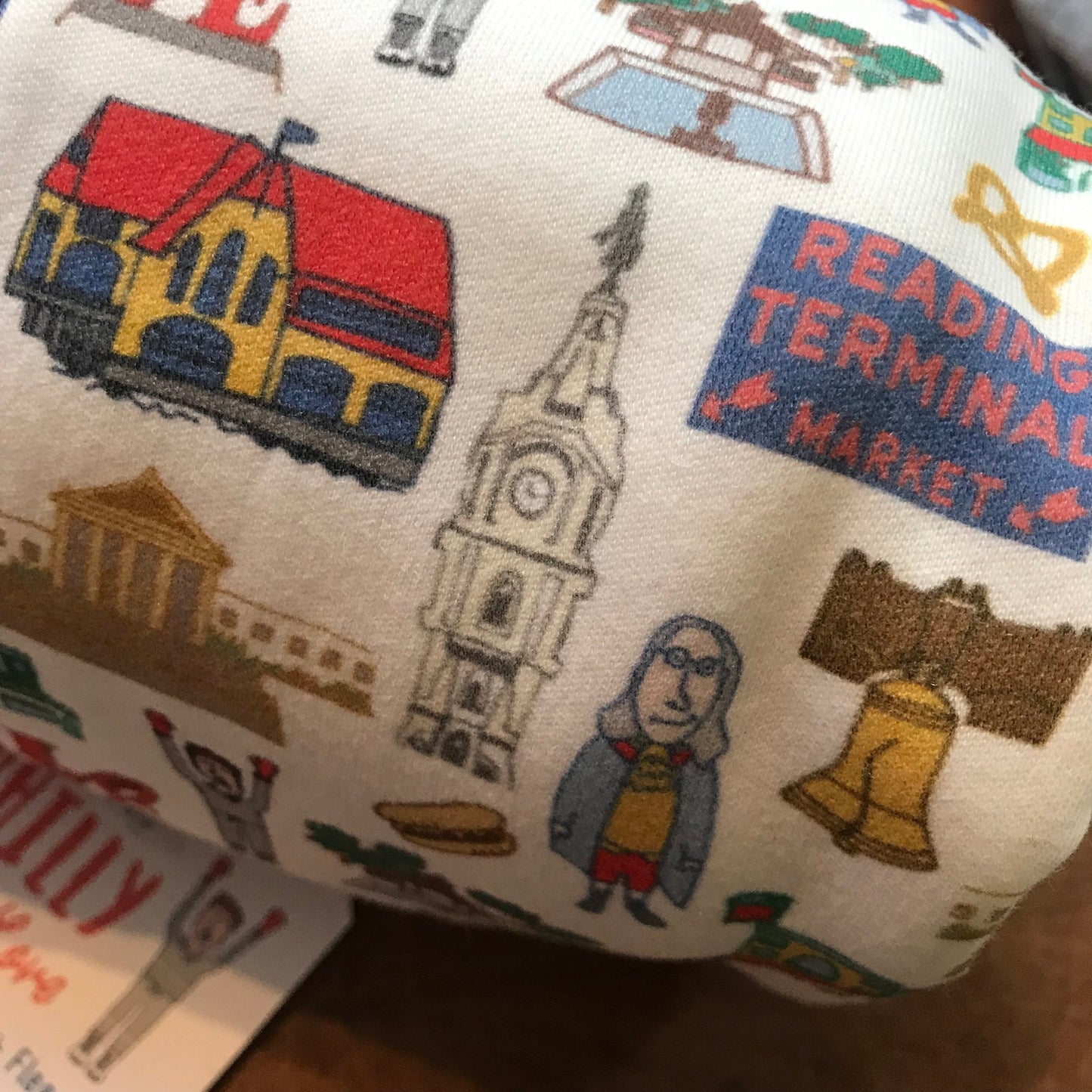 Organic cotton Philly baby blanket featuring Philadelphia landmarks and symbols designed by Ana Thorne.