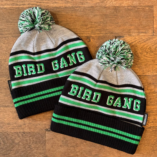 Two Bird Gang Eagles Beanies by South Fellini are perfect for any Eagles fan. Both hats feature gray, black, green, and white stripes with the text 