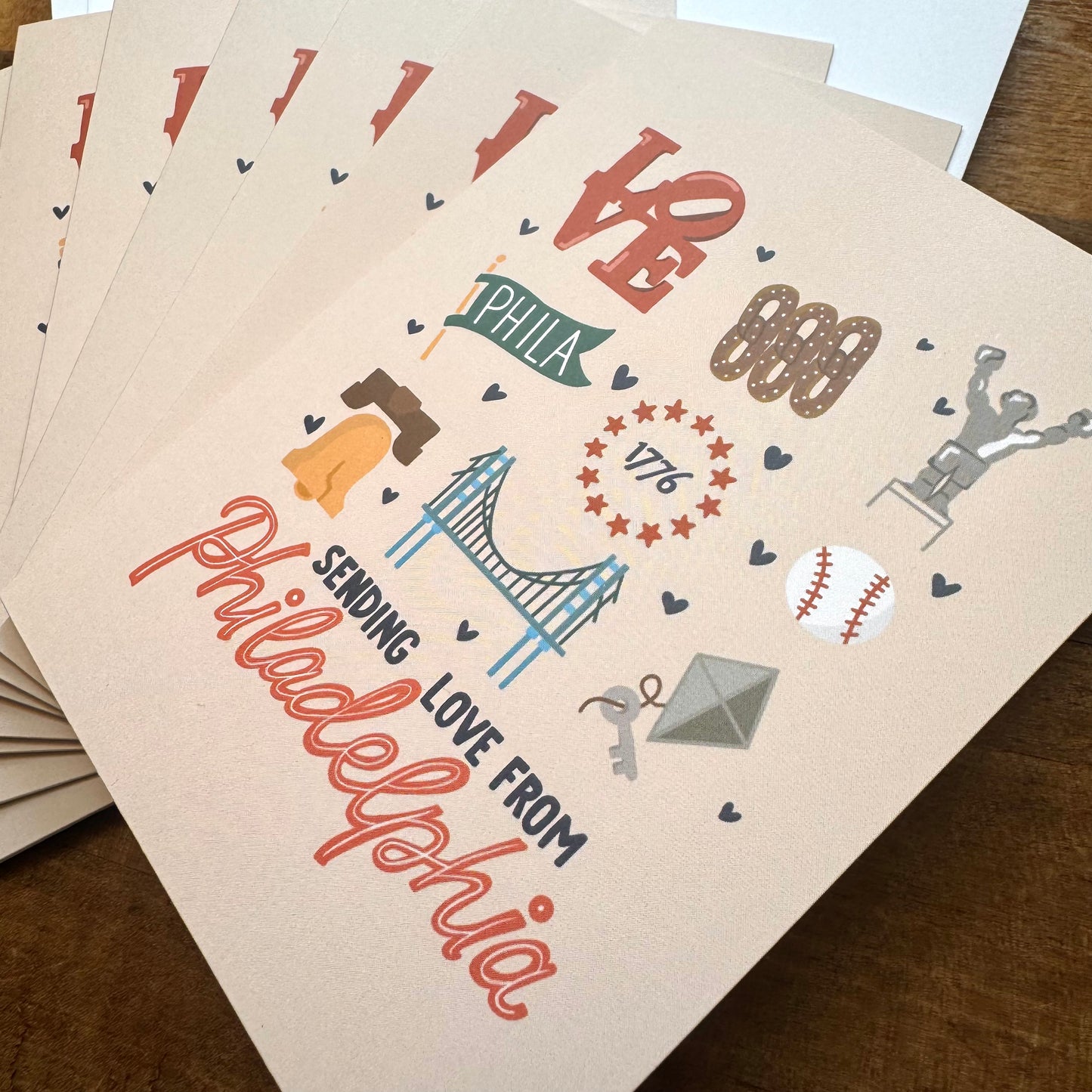 Introducing the Philadelphia Notecard Pack by Parcel Island, this collection showcases delightful Philly-inspired illustrations like the Liberty Bell, LOVE sculpture, Ben Franklin Bridge, along with a charming "Sending Love from Philadelphia" message. Ideal for blank cards to express your heartfelt sentiments.