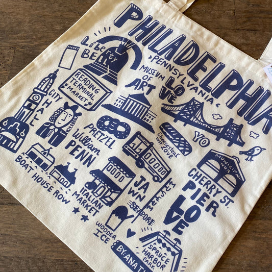 Illustrated lightweight canvas Philadelphia Icons Tote Bag featuring iconic symbols and landmarks of Philadelphia by Ana Thorne.