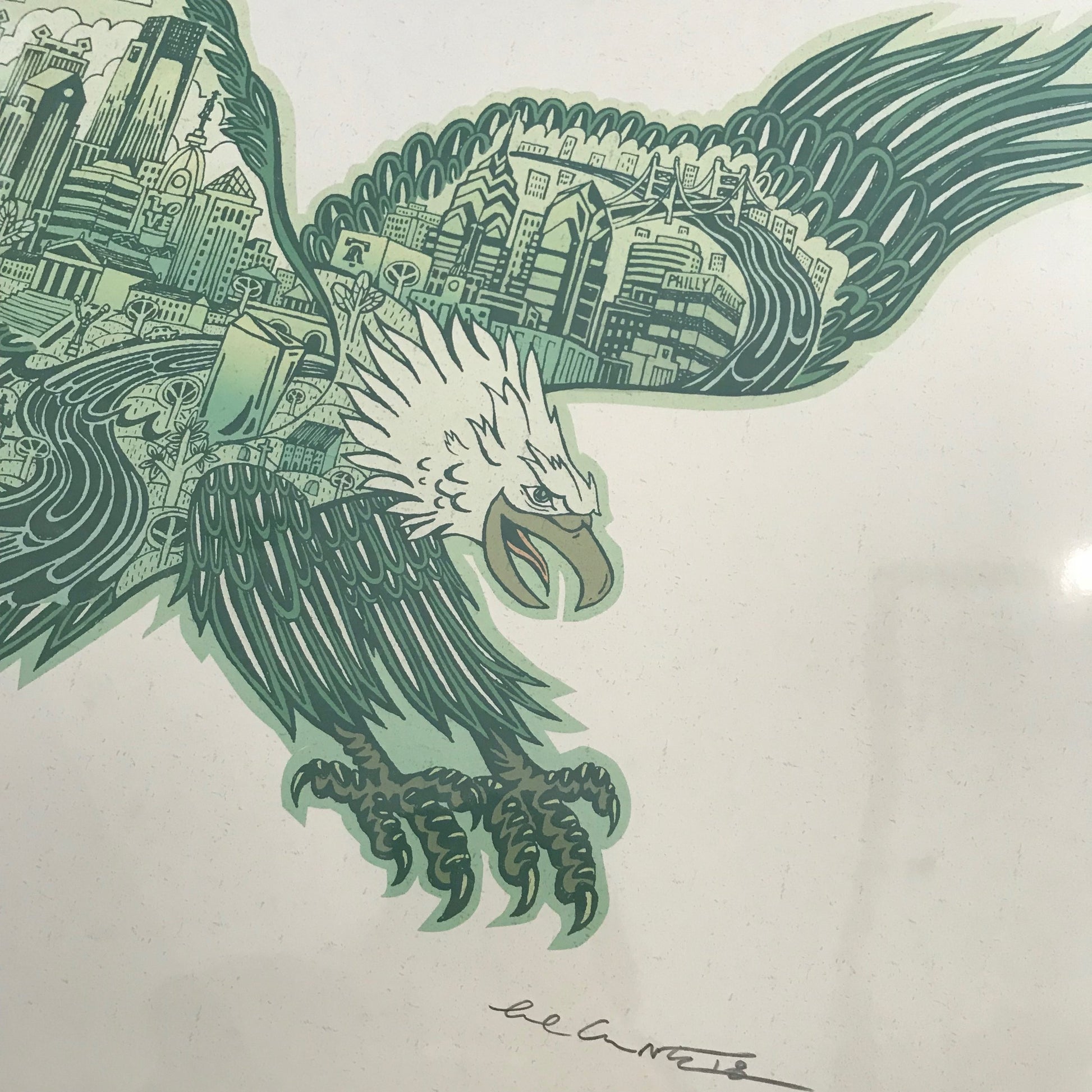 Swooping Eagle Print by Paul Carpenter, an artistic rendering of an eagle in flight, its wings and body fused with urban architectural elements, predominantly in shades of green, and incorporating the Philadelphia skyline design. Signed by the artist "Leo Hunter.